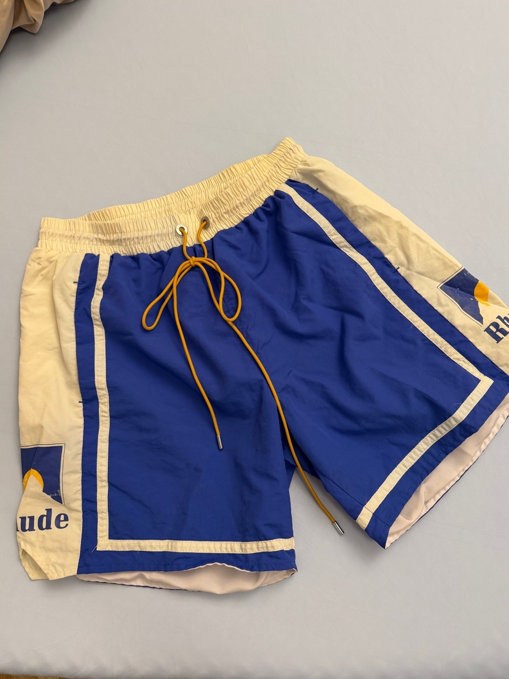 Rhude Blue & White Logo Shorts with Yellow Drawcord L